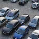 Parkeerplaats waarin het begin van je rijbewijs traject visueel wordt uitgelegd met stappen naar het behalen van je rijbewijs